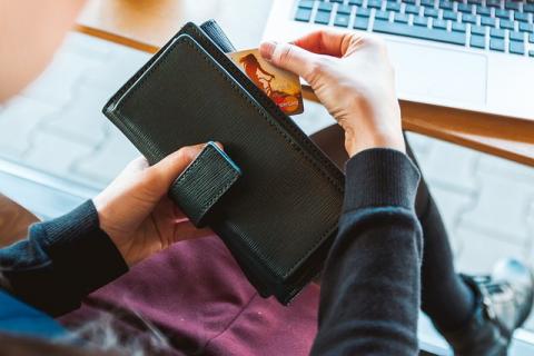 taking credit card out of wallet